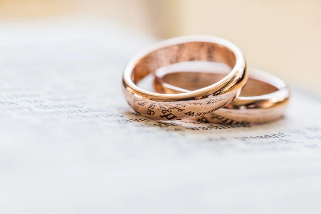 Two rings on top of a book