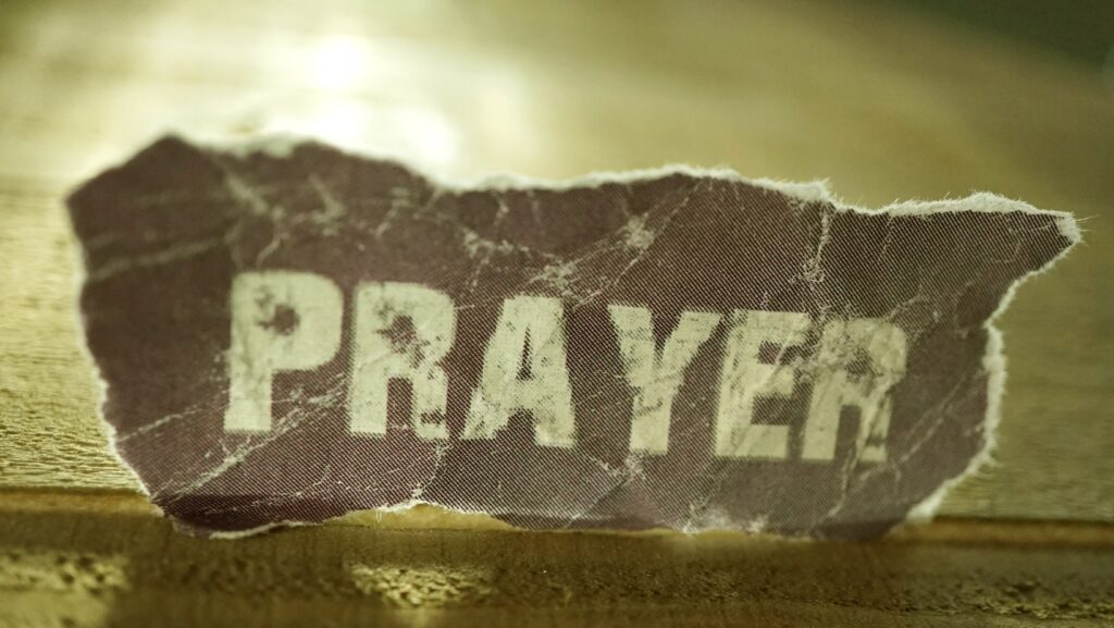 Prayer written on a paper kept on the ground