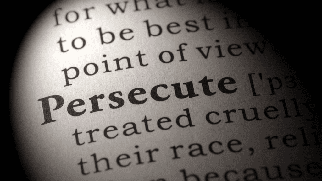 The word Persecute focused on a page