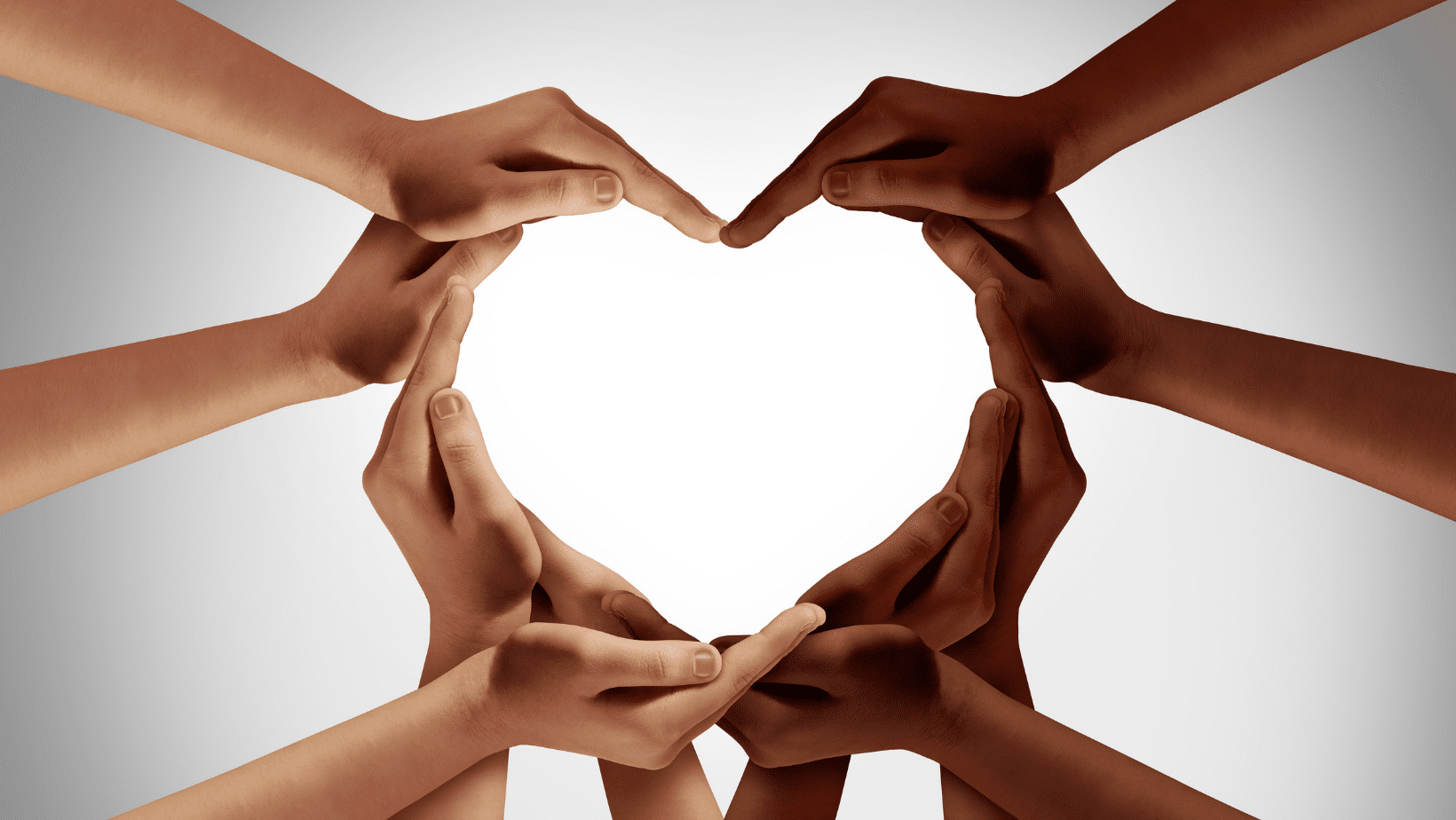 Different people making a heart figure