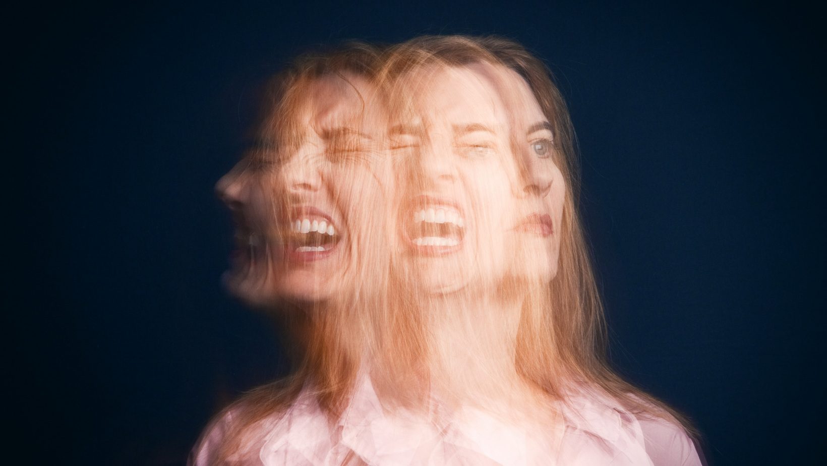 Women facing stress and trauma with a blue background