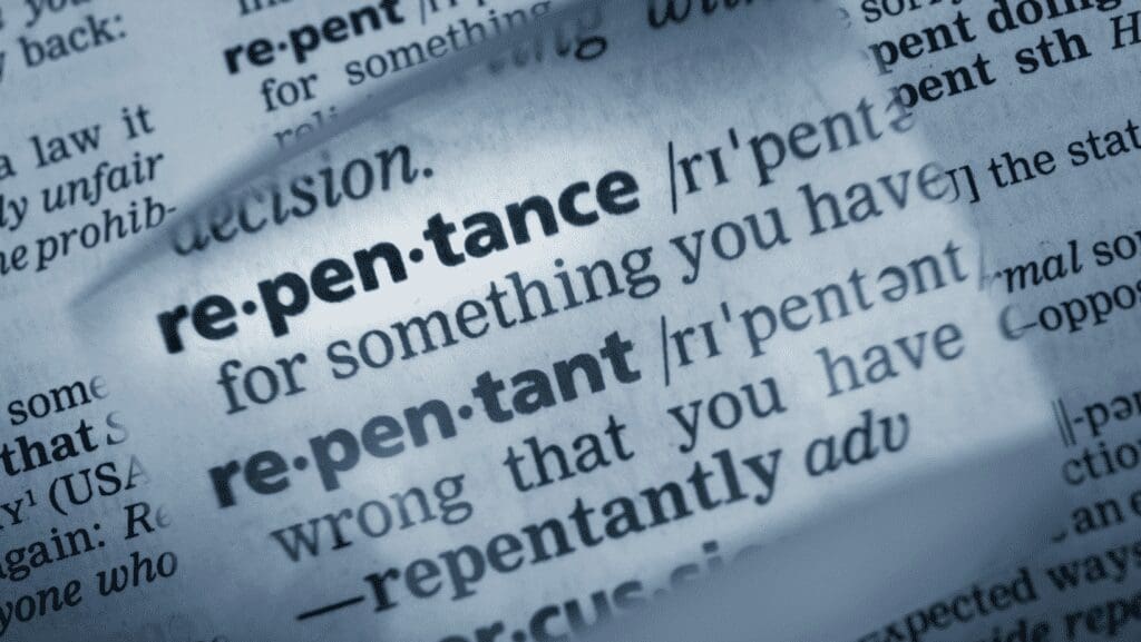Magnifying glass highlighting "repentance" in dictionary.