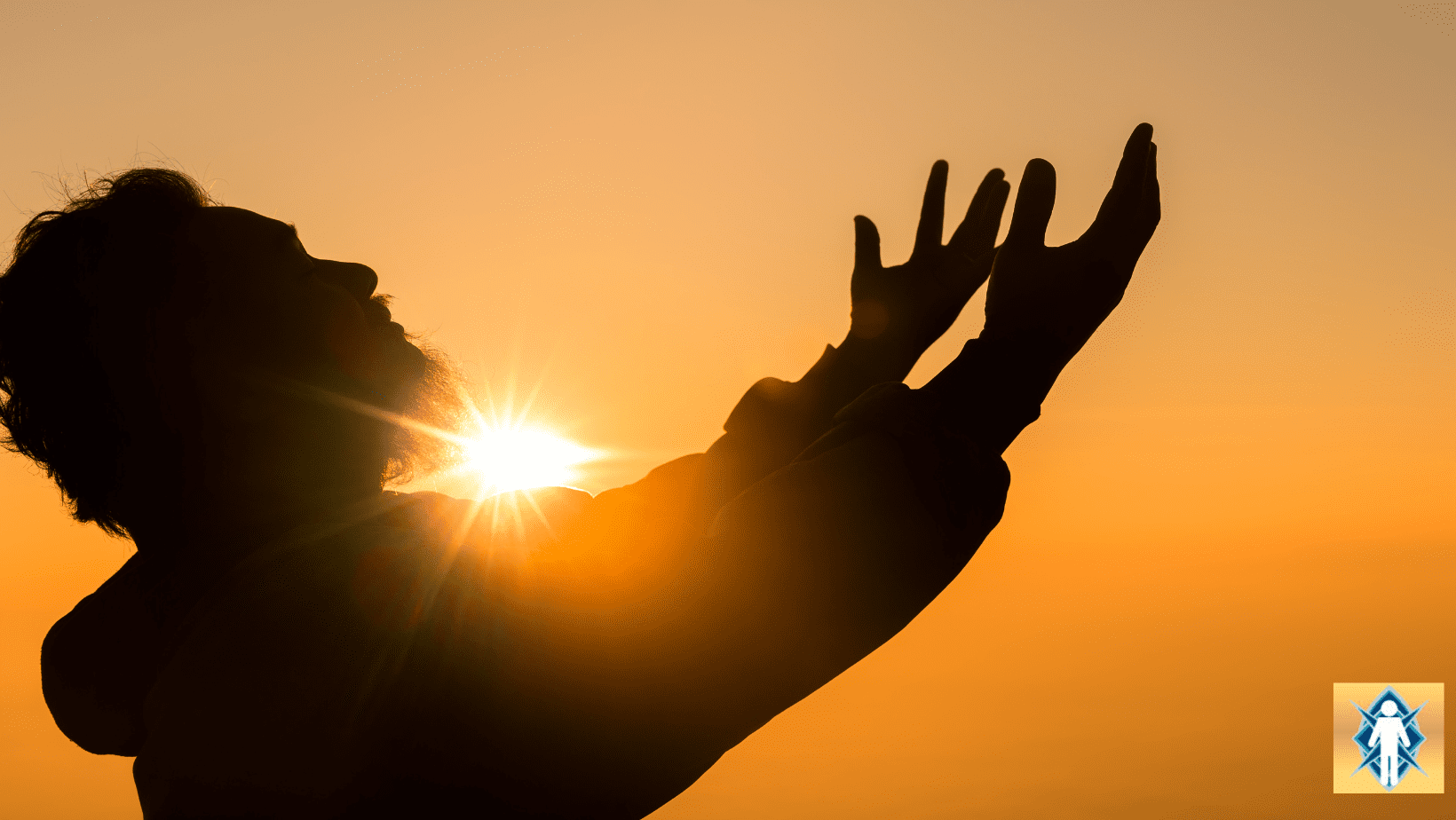 Silhouette of person reaching towards sunset sky.