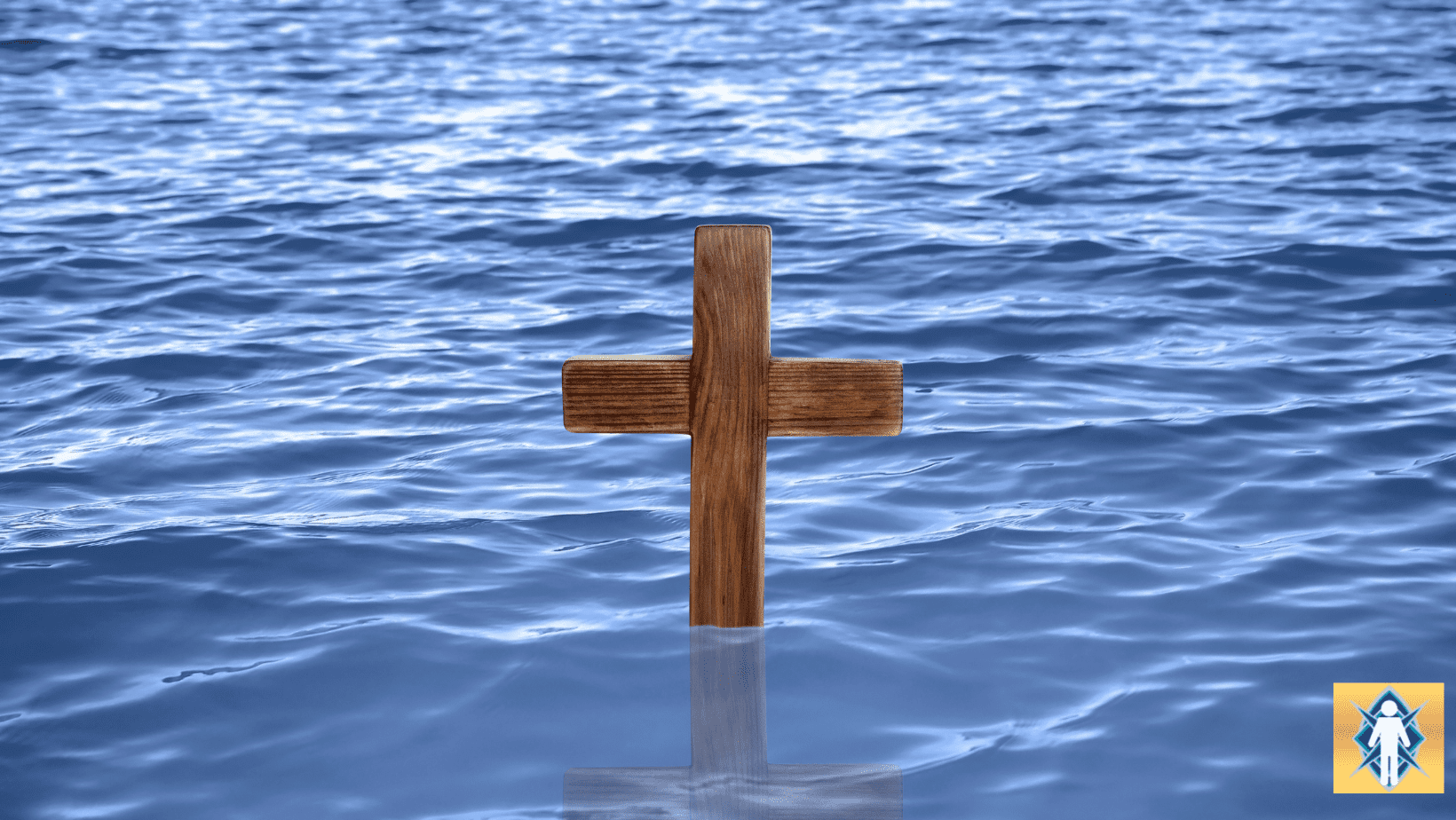 Wooden cross floating on calm blue water.