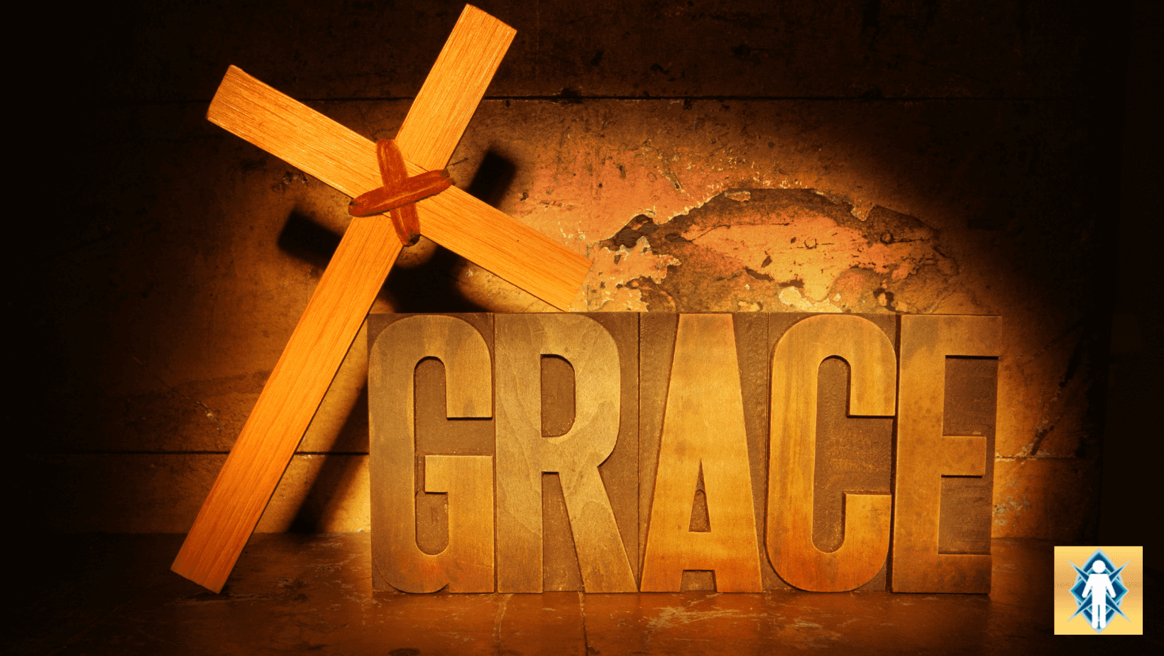 Wooden cross with "GRACE" text background.