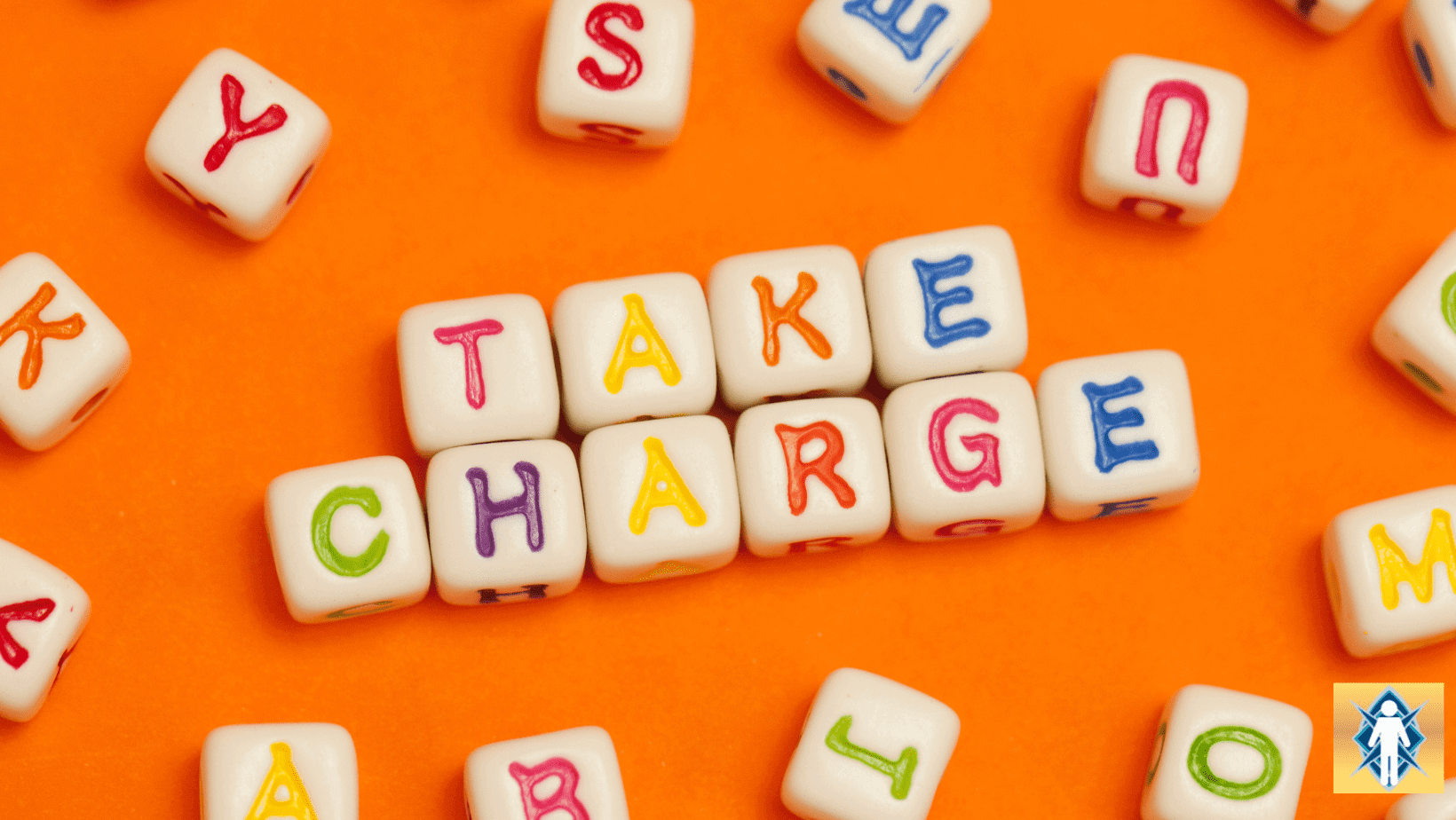 Letter blocks spelling "Take Charge" on orange.