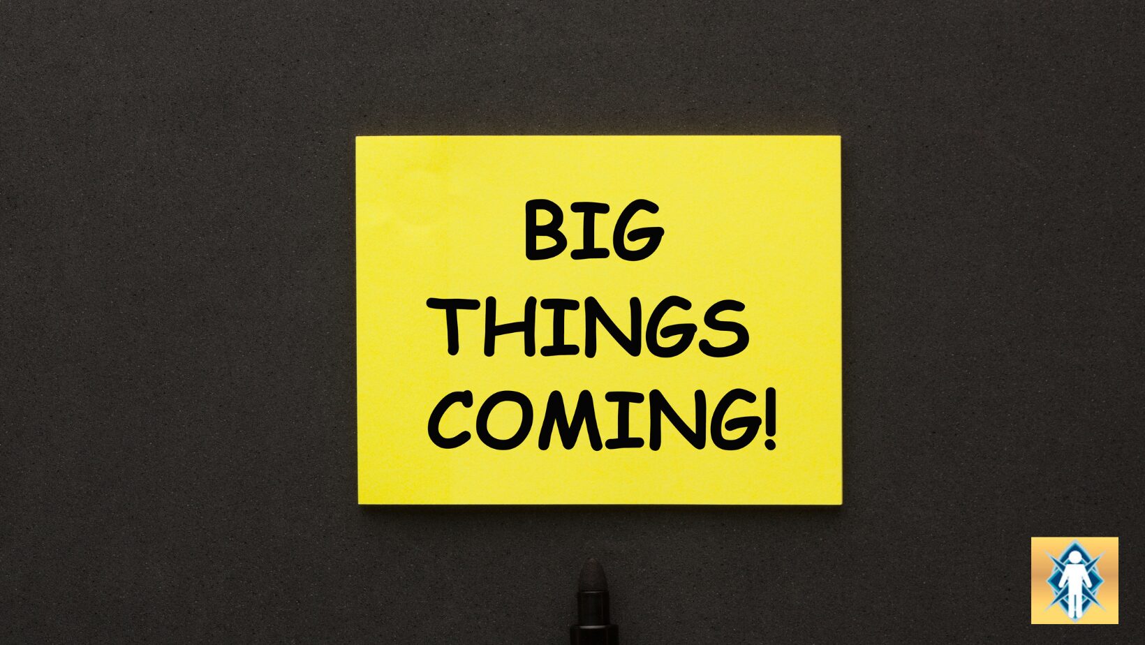 Yellow sticky note with 'BIG THINGS COMING!' message on black background.