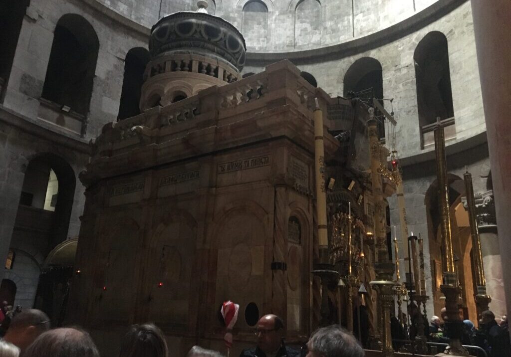 Stone structure inside a historical religious building.