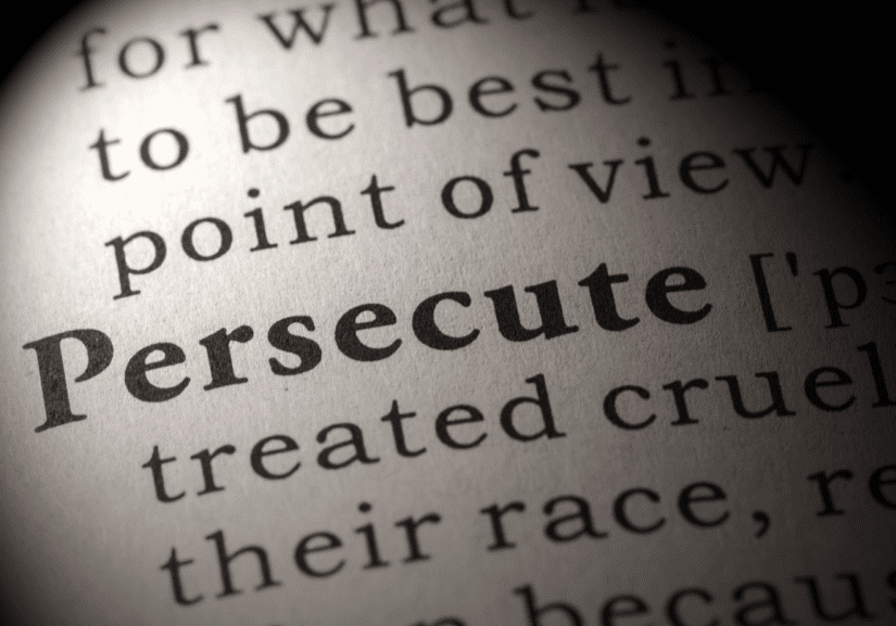 The word Persecute focused on a page