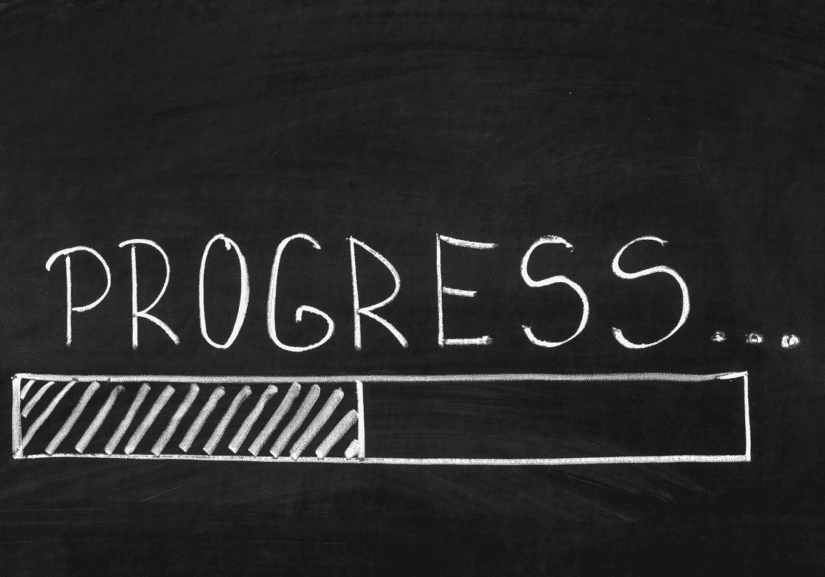 Progress bar on chalkboard background.