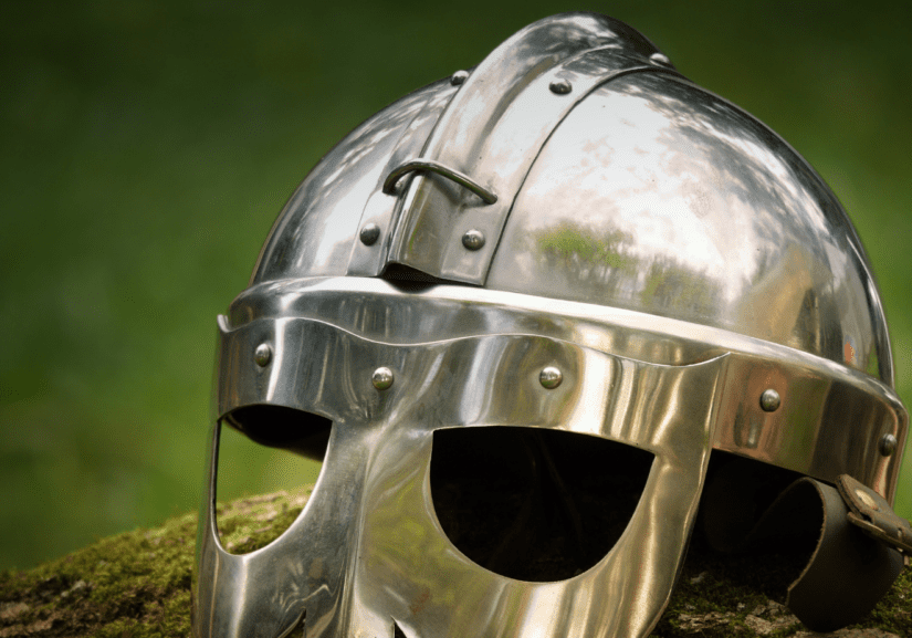 A metal helmet kept on a ground