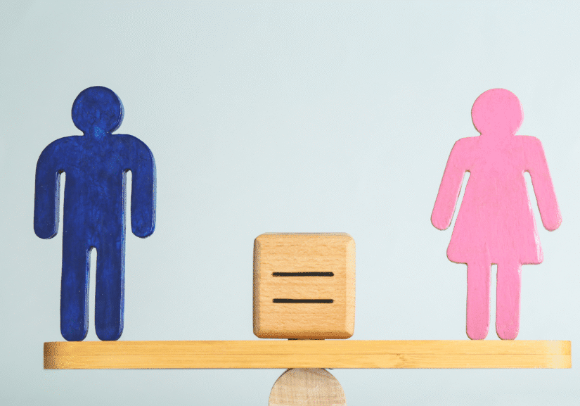 Blue and pink figures on balanced scale.