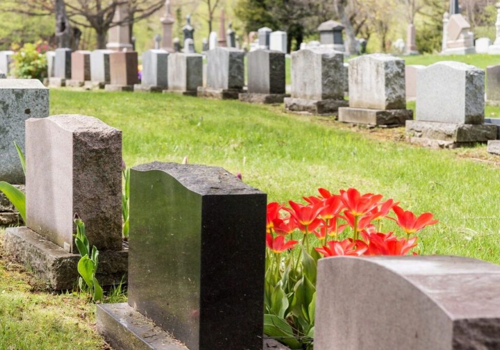 Different tombstones at a graveyard