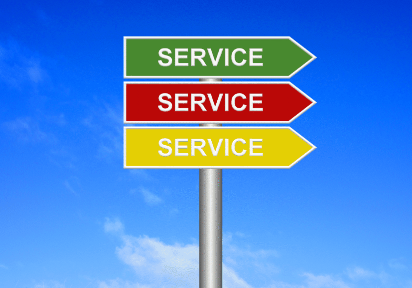Service signs pointing in different directions.