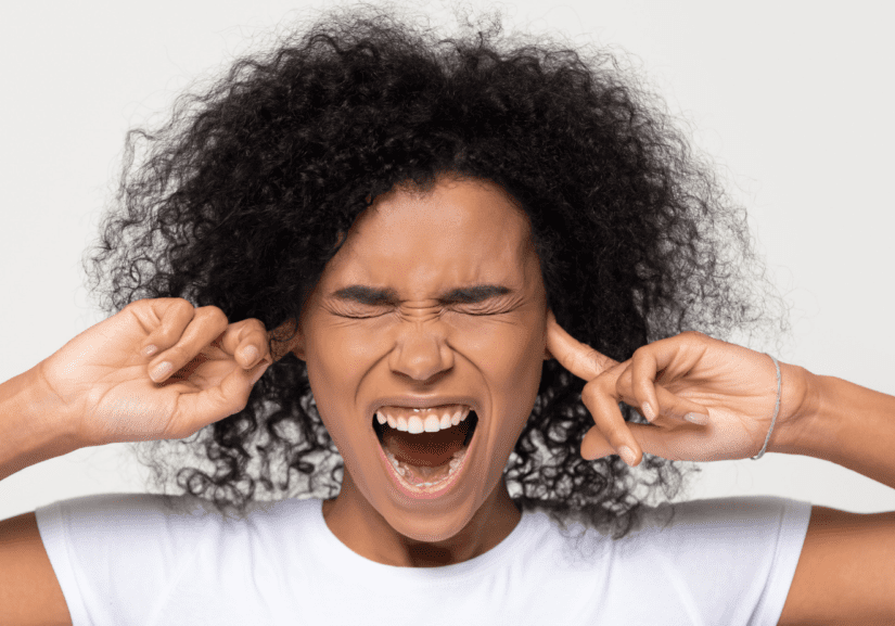 A Girl Shouting With Fingers In Hand